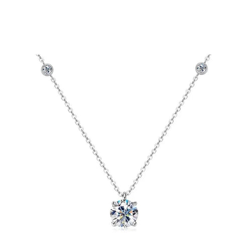 Women's silver 925 necklace with a large round solitaire pendant and two smaller accent stones