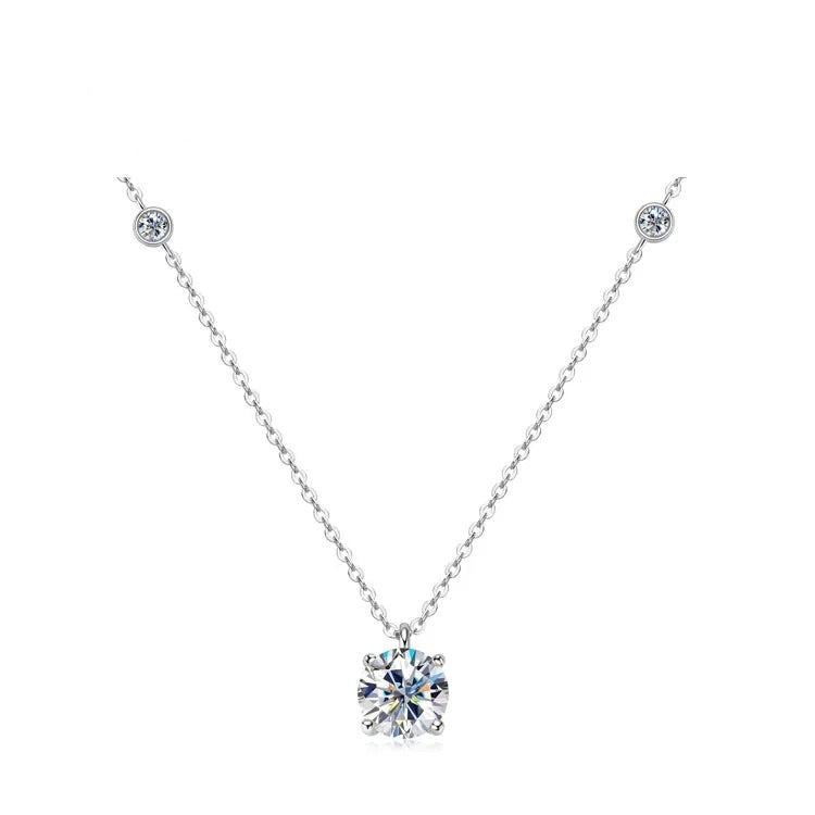 Women's silver 925 necklace with a large round solitaire pendant and two smaller accent stones