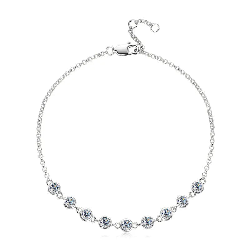 Dainty women's silver 925 bracelet with round bezel-set cubic zirconia stones and lobster clasp