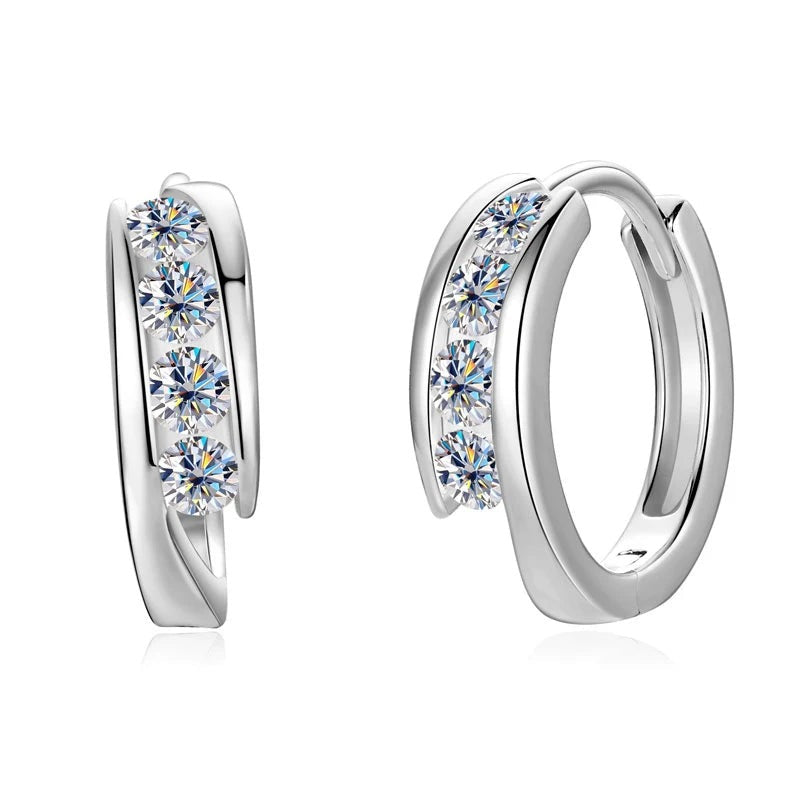 Women's polished silver huggie hoop earrings with five sparkling round moissanite stones
