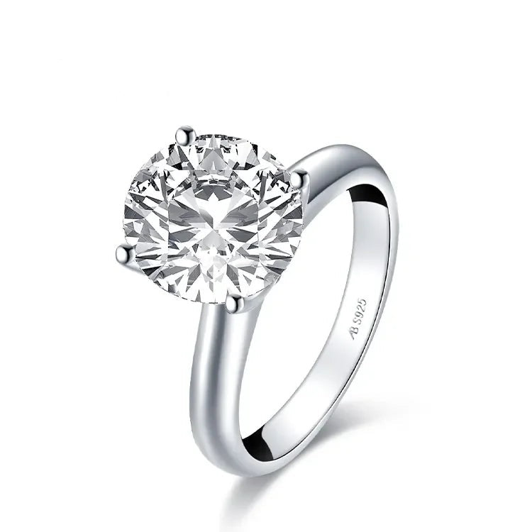 Sparkling round cut diamond solitaire ring in polished silver 925 for women