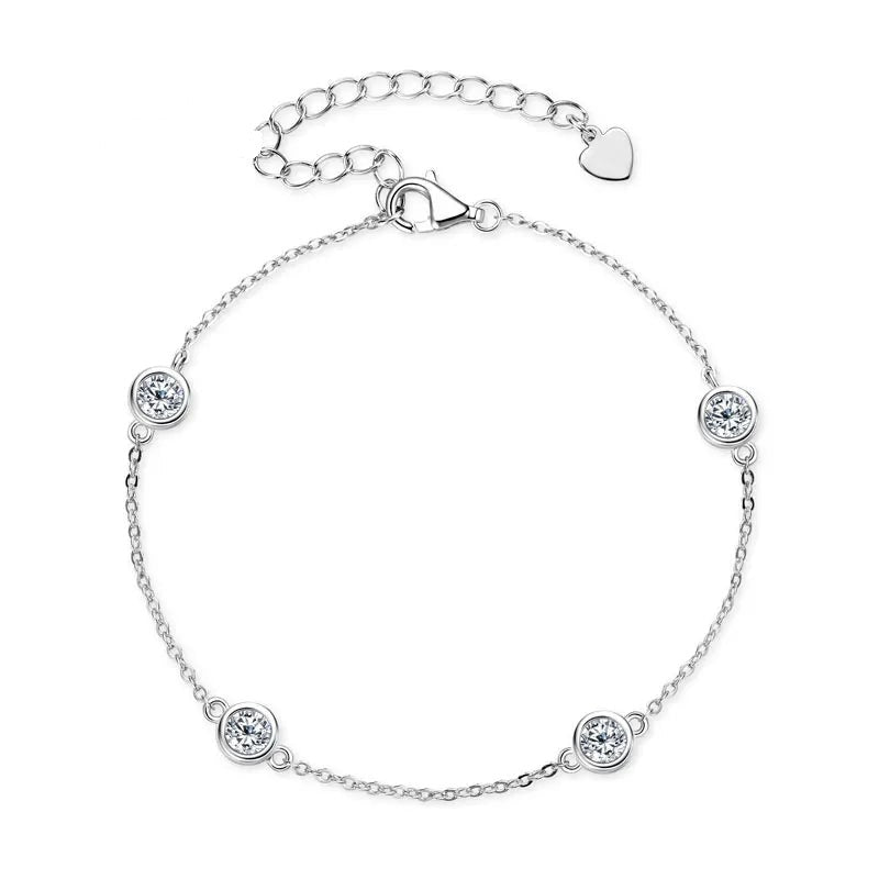 Women's silver 925 bracelet with bezel-set round moissanite stones and heart charm