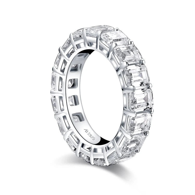 Sparkling women's silver eternity band ring with emerald cut cubic zirconia stones
