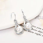 Pearl And Cubic Zirconia Infinity Dangle Earrings