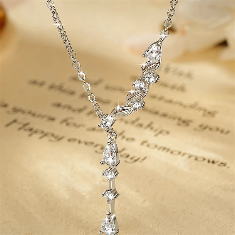 Asymmetrical Wave Drop Necklace with Pear-Shaped Zirconia