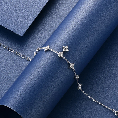 Claw Set Moissanite Clover Bracelet in Sterling Silver