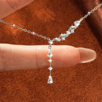 Asymmetrical Wave Drop Necklace with Pear-Shaped Zirconia