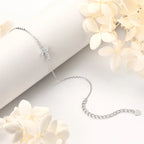 Small Moissanite Cross Bracelet in Sterling Silver