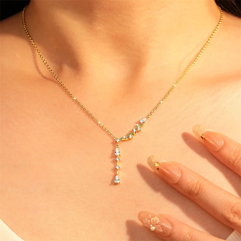 Asymmetrical Wave Drop Necklace with Pear-Shaped Zirconia