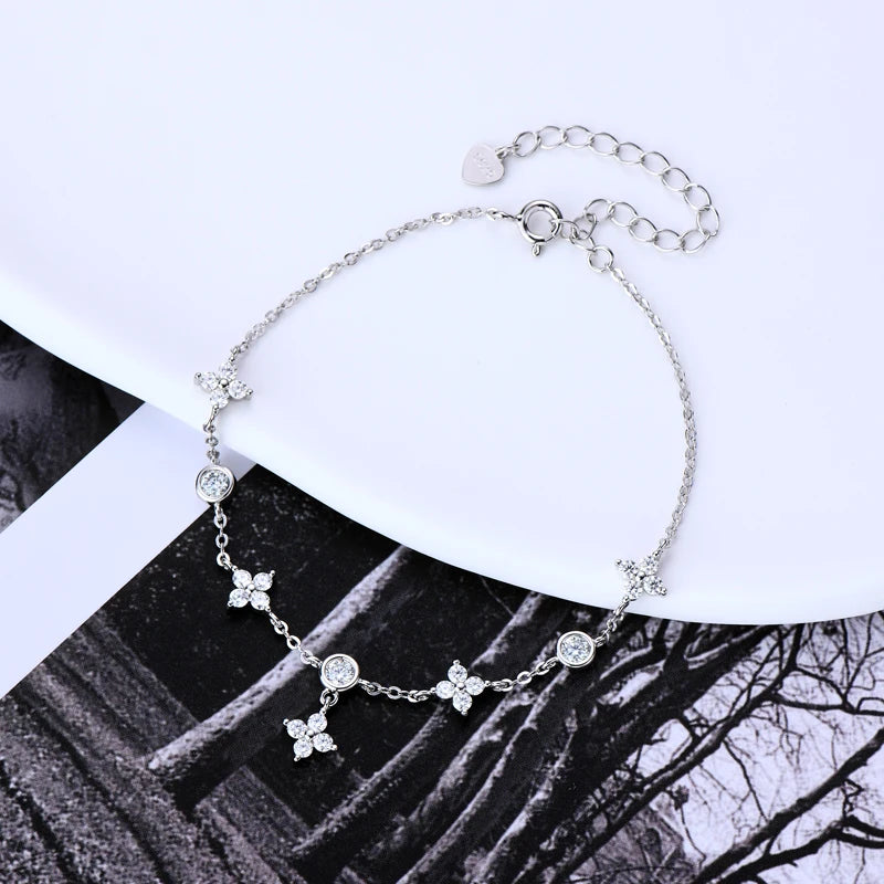 Claw Set Moissanite Clover Bracelet in Sterling Silver