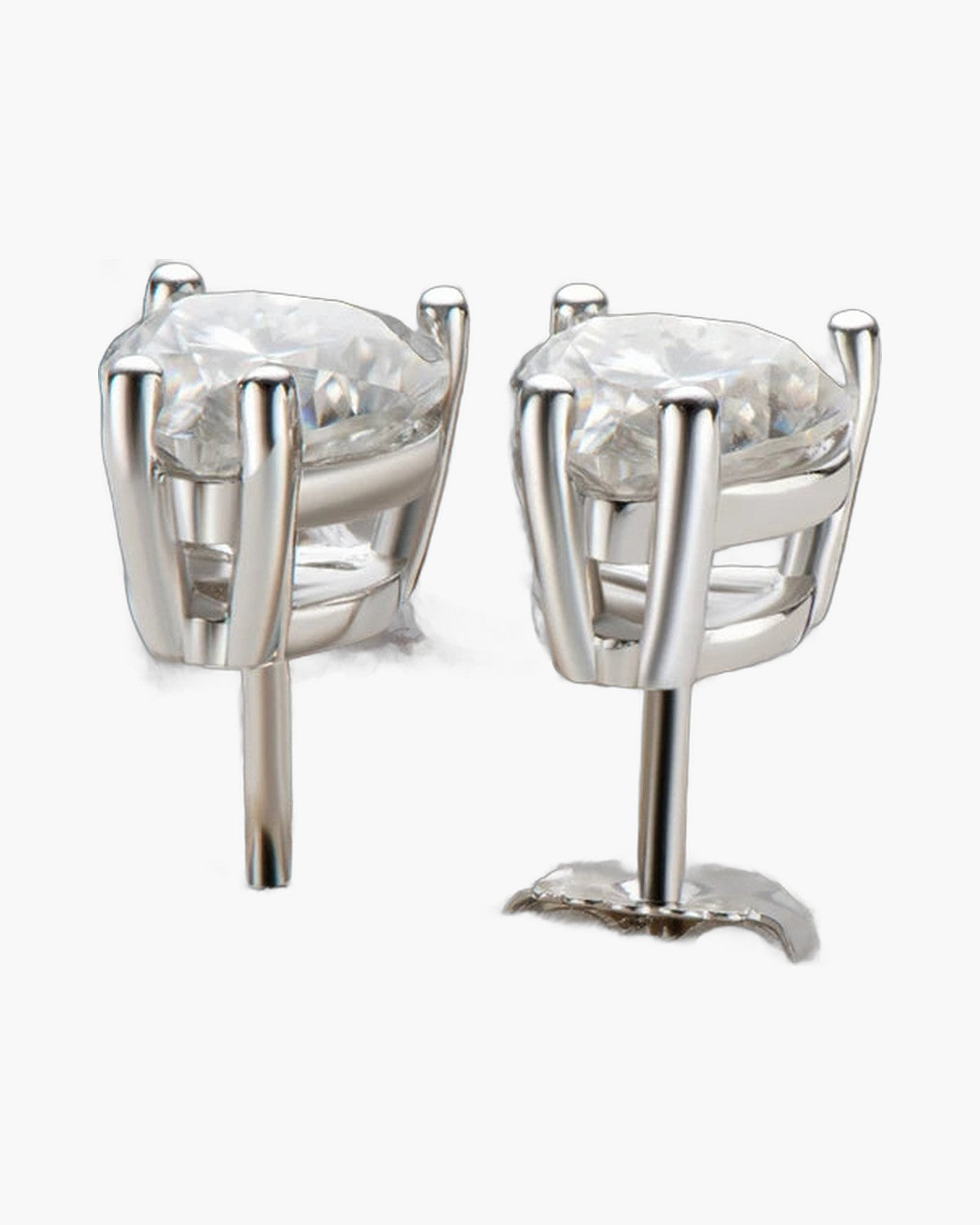 Sparkling women's silver 925 stud earrings with large clear stones in a jewelry box