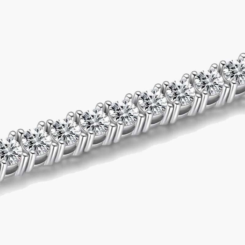 Close-up of a women's silver tennis bracelet with brilliant round cubic zirconia stones