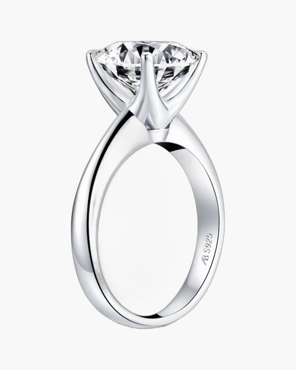 Sparkling round cut diamond set in a polished silver 925 women's engagement ring