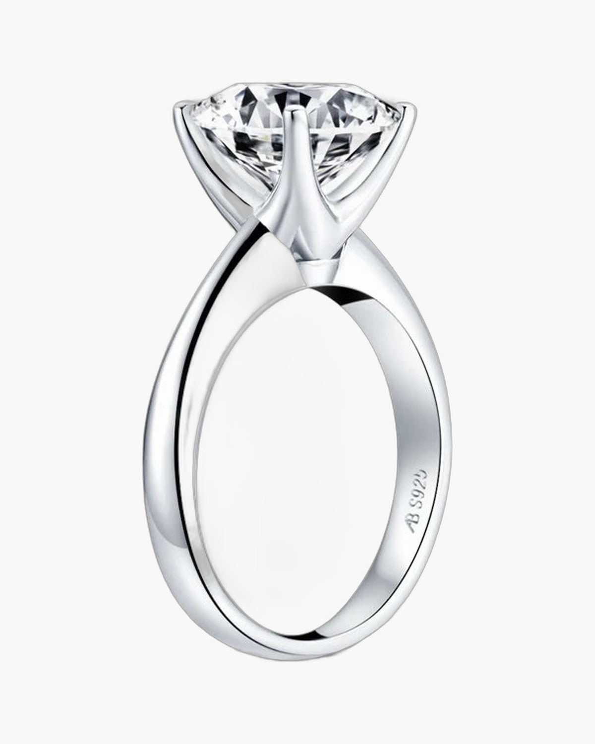 Sparkling round cut diamond set in a polished silver 925 women's engagement ring