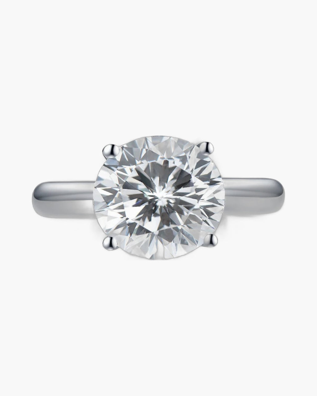 Sparkling round cut diamond engagement ring set in a polished silver band