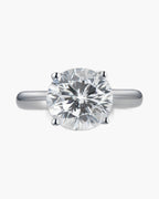 Sparkling round cut diamond engagement ring set in a polished silver band