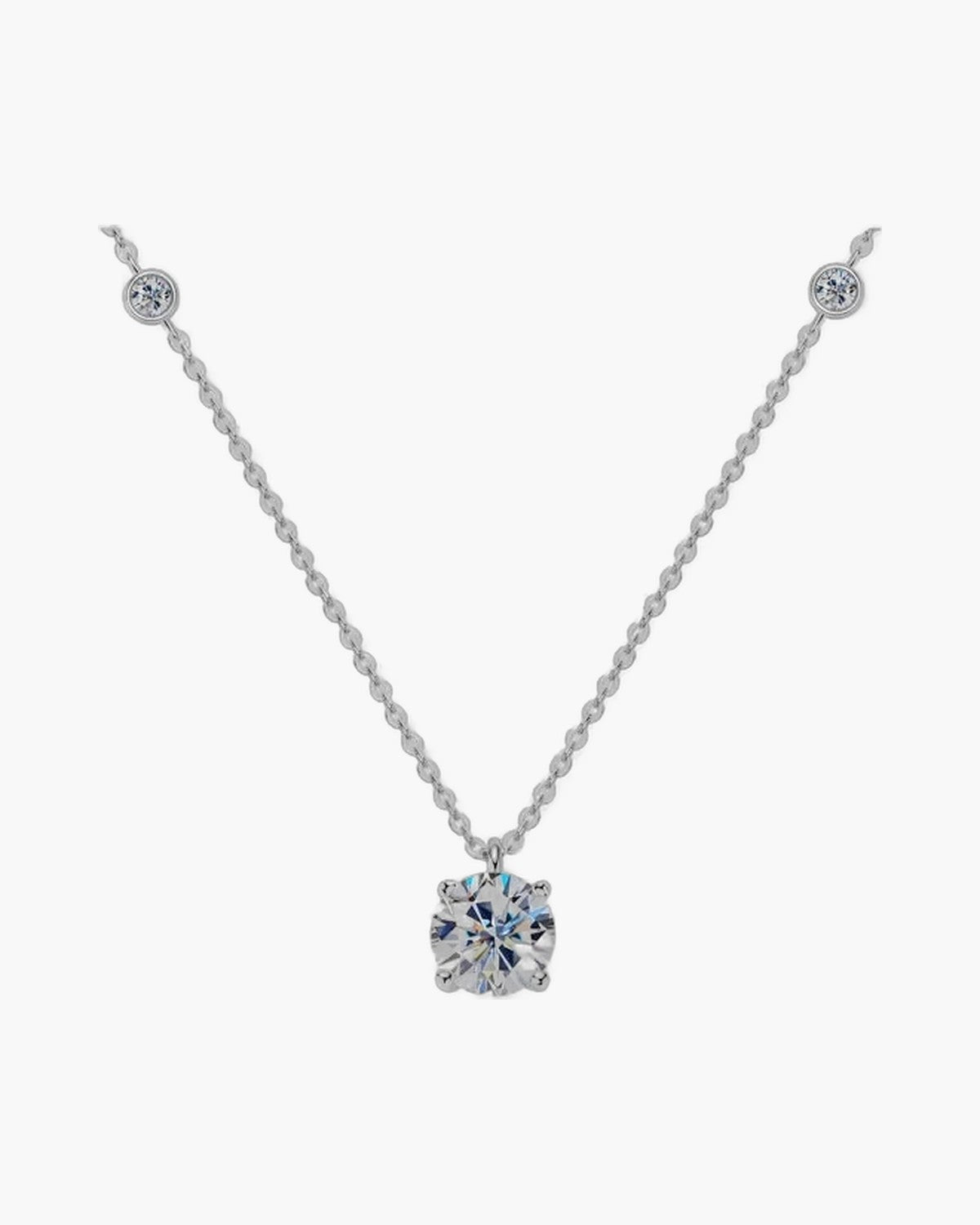 Women's silver 925 necklace with a large round solitaire pendant and two smaller accent stones