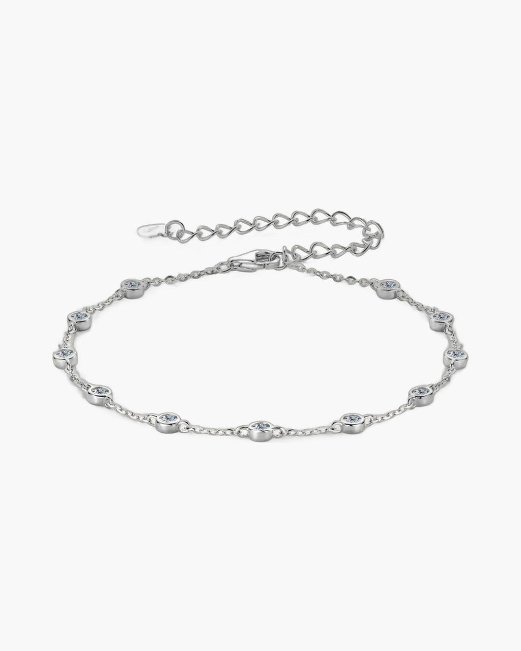 Elegant women's silver 925 bracelet with bezel-set cubic zirconia stones on a light background