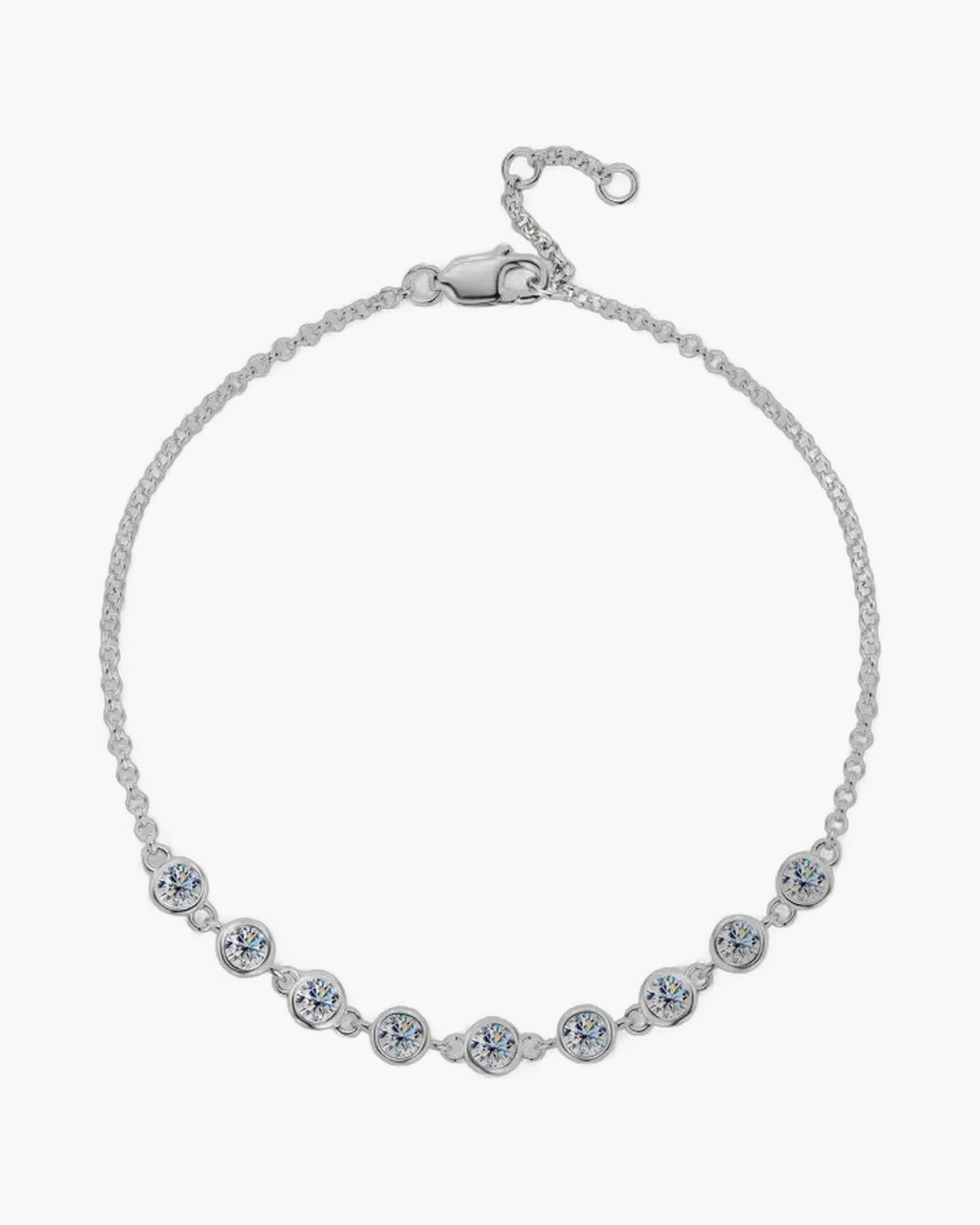 Dainty women's silver 925 bracelet with round bezel-set cubic zirconia stones and lobster clasp