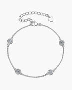 Women's silver 925 bracelet with bezel-set round moissanite stones and heart charm