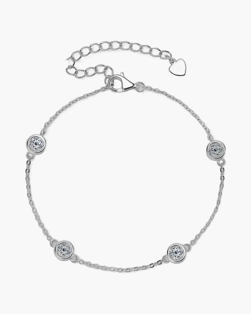 Women's silver 925 bracelet with bezel-set round moissanite stones and heart charm