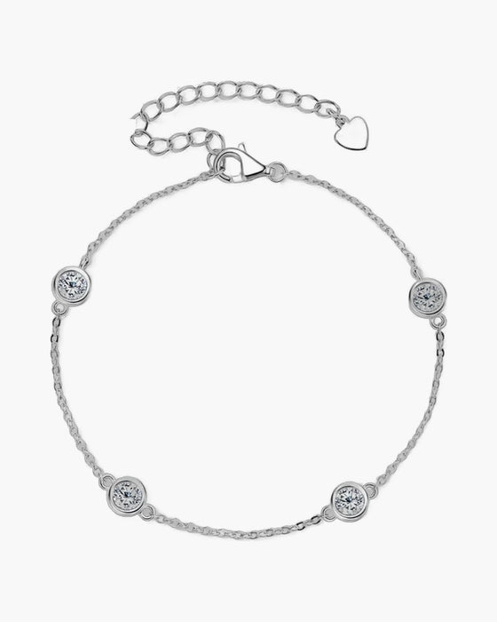 Women's silver 925 bracelet with bezel-set round moissanite stones and heart charm