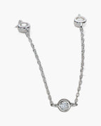 Delicate women's silver chain necklace with a single bezel-set round brilliant diamond pendant