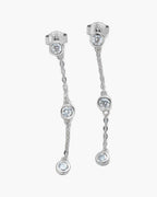 Dainty women's silver 925 drop earrings with three bezel-set cubic zirconia stones