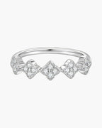 Sparkling women's silver 925 ring with five diamond-studded clover shapes on a light background