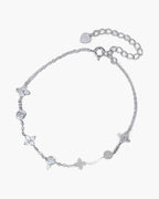 Delicate women's silver 925 bracelet with sparkling cubic zirconia flowers and round stones