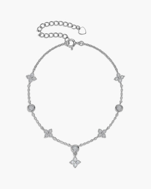 Delicate women's silver 925 bracelet with sparkling cubic zirconia flowers and round stones