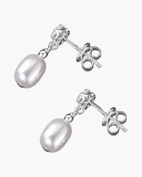 Elegant women's silver 925 stud earrings with dangling white freshwater pearls on blue fabric