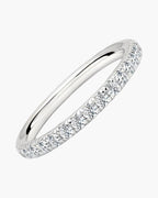 Elegant women's silver 925 ring with a row of sparkling diamonds on a white background