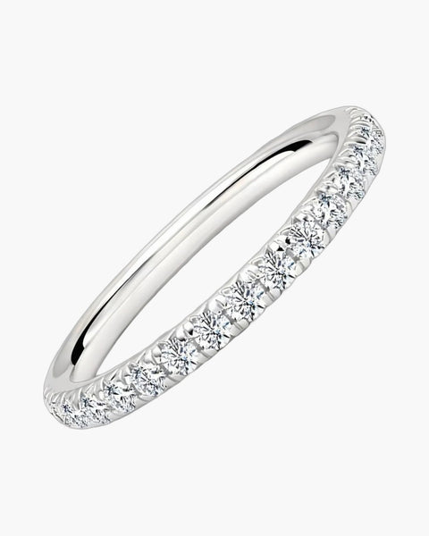 Elegant women's silver 925 ring with a row of sparkling diamonds on a white background