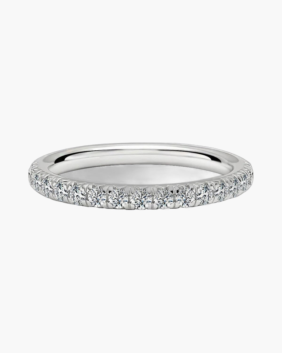 Elegant women's silver ring with a row of sparkling diamonds on a white background