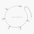 Delicate women's silver 925 chain bracelet with five dangling white pearl charms