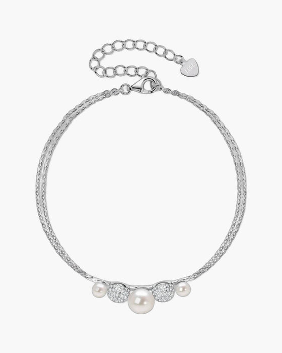 Elegant women's silver 925 bracelet with lustrous pearls and sparkling pave crystal beads