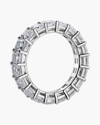 Sparkling women's silver eternity band ring with clear emerald cut cubic zirconia stones