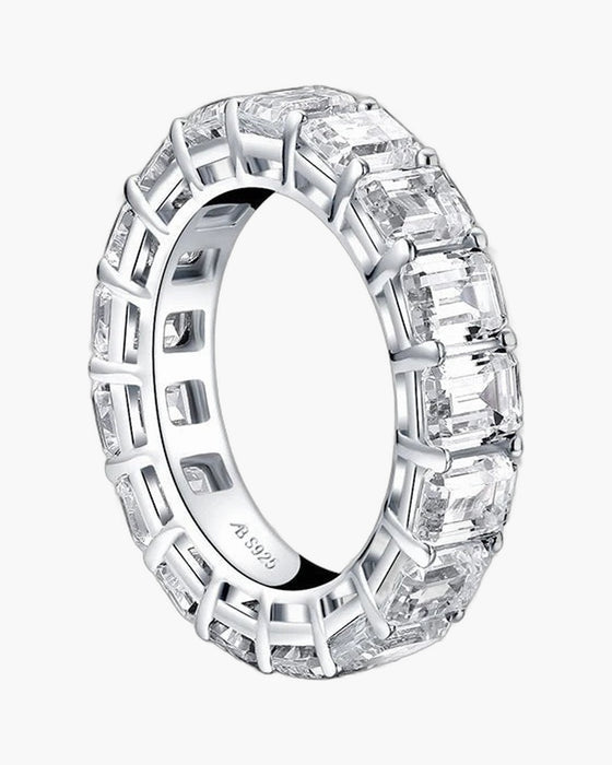 Sparkling women's silver eternity band ring with emerald cut cubic zirconia stones