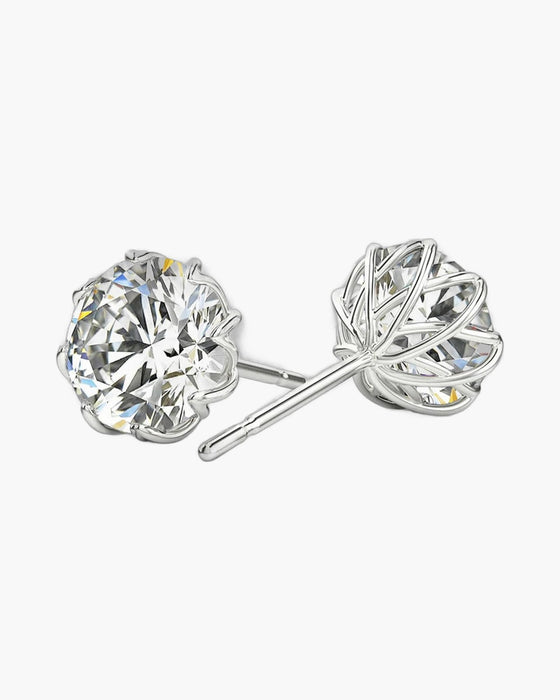 Sparkling round moissanite flower stud earrings in polished silver for women