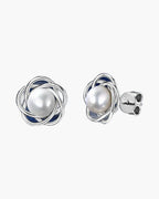 Elegant women's silver 925 stud earrings with a lustrous white pearl center