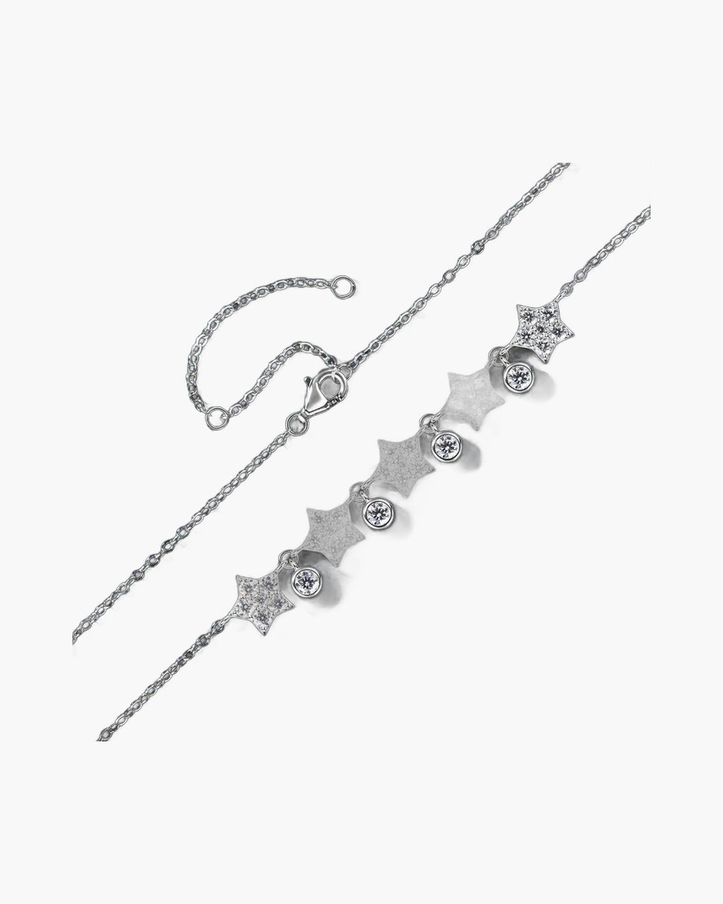 Sparkling silver 925 women's bracelet with star and round cubic zirconia charms on blue background