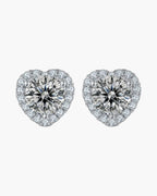 Pair of women's silver 925 heart-shaped stud earrings with sparkling clear cubic zirconia