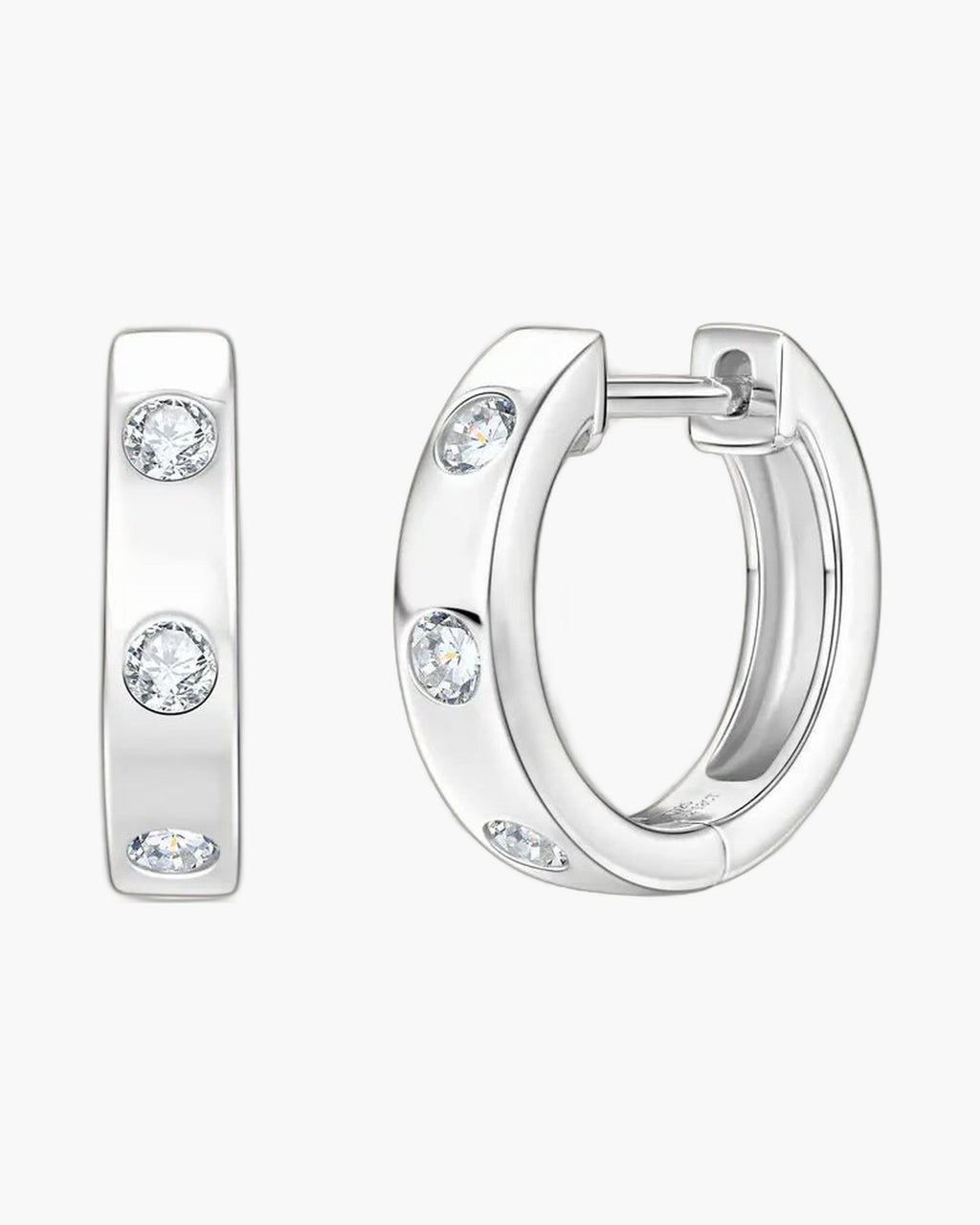 Women's silver 925 huggie hoop earrings with bezel-set round brilliant moissanite stones