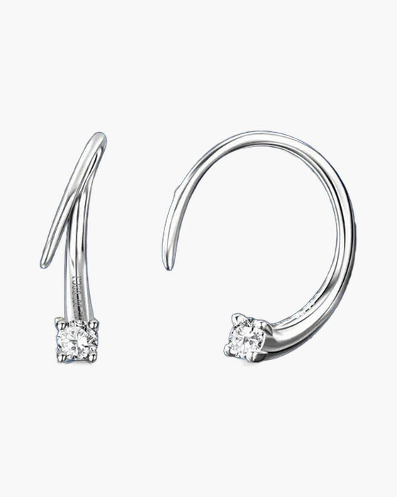 Elegant women's silver 925 hoop earrings with sparkling solitaire cubic zirconia on blue background