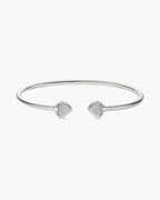 Polished silver open cuff bangle with two pavé heart ends for women