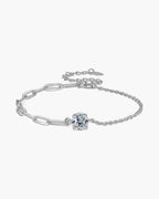 Women's elegant silver 925 bracelet with a sparkling round solitaire diamond on white background