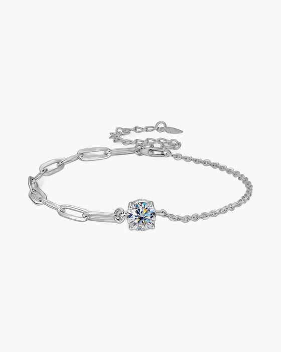 Women's elegant silver 925 bracelet with a sparkling round solitaire diamond on white background