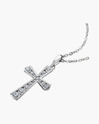 Sparkling silver cross pendant with brilliant cubic zirconia stones on a delicate chain
