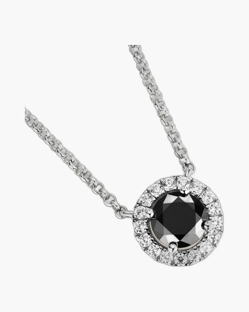 Women's silver chain necklace with a black moissanite halo pendant and round white stones